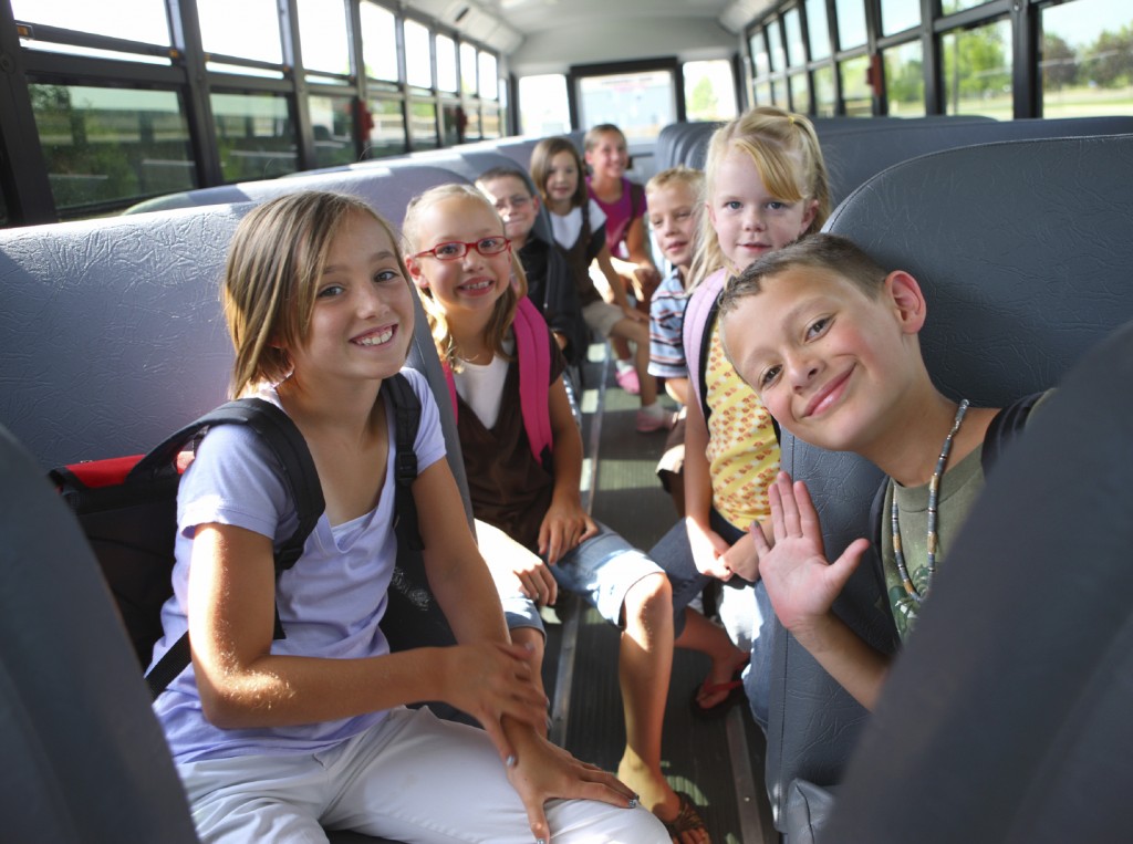 happy-kids-on-bus-restore-behavioral-health
